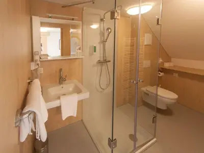 Familiensuite .- Badezimmer