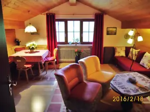 Lassen Sie die Seele baumeln im gemütlichen Wohnzimmer mit Kochnische