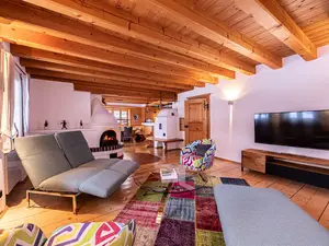 Wohnbereich mit Holzofen Ferienhaus Gipfelstürmer