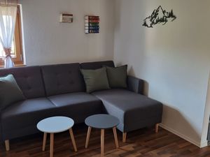 Wohnzimmer mit Schlafsofa