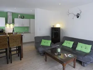 Wohnzimmer mit offener Küche Wohnzimmer mit offener Küche