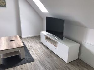 Flat TV im offenen Wohnbereich