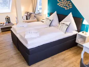 kombinierter Wohn- und Schlafbereich in der Junior Suite