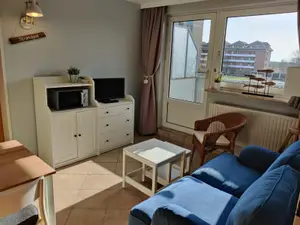 Wohnraum mit Zugang zum Balkon Wohnraum mit Zugang zum Balkon