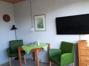 Sitzbereich im Wohn-Schlafraum Sitzbereich im Wohn-Schlafraum