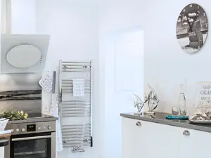 Kochbereich. Gemütliche Wohnküche Kochbereich. Gemütliche Wohnküche