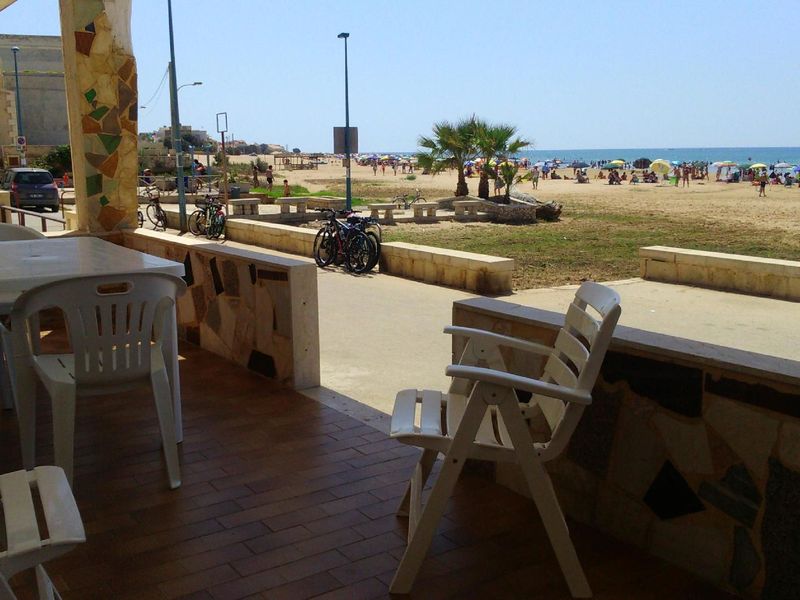 Veranda mit Blick auf den Strand