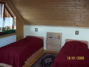 Schlafzimmer mit getrennte Betten