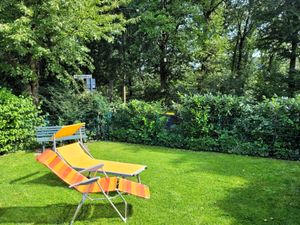 Ferienhaus Merle Garten mit Terrasse