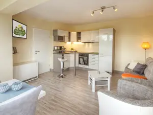 Wohnzimmer mit Küche