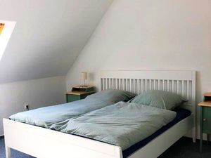 Schlafzimmer mit Doppelbett