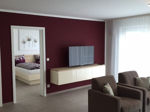 Wohnzimmer Blick ins Schlafzimmer