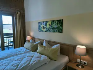 Unser Zimmer "Sonnenblume" mit Balkon und Bergblick