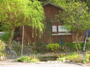 Gartenhaus mit Grillplatz