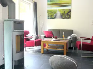 Wohnbereich mit Ofen Wohnbereich mit Ofen