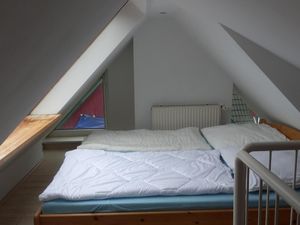 Doppelbett im Spitzboden