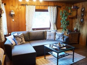 Wohnzimmer mit Schlafsofa