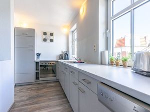 in den Wohnbereich integrierte offene Küche