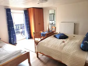 Zimmer 3 / Erde / Dreibettzimmer