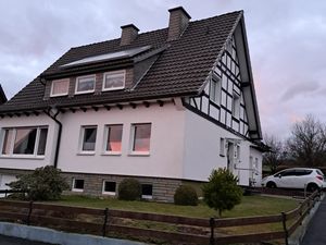 Haus mit Blick auf Parkplatz