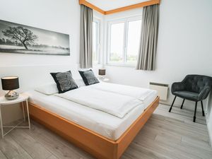 Komfortapartment F Schlafzimmer