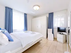 Ferienwohnung "Garten"- Schlafzimmer