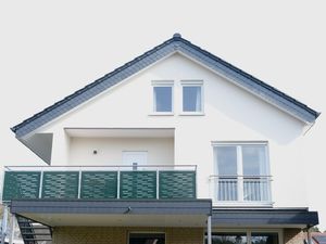 Außenansicht des Hauses mit dem Balkon