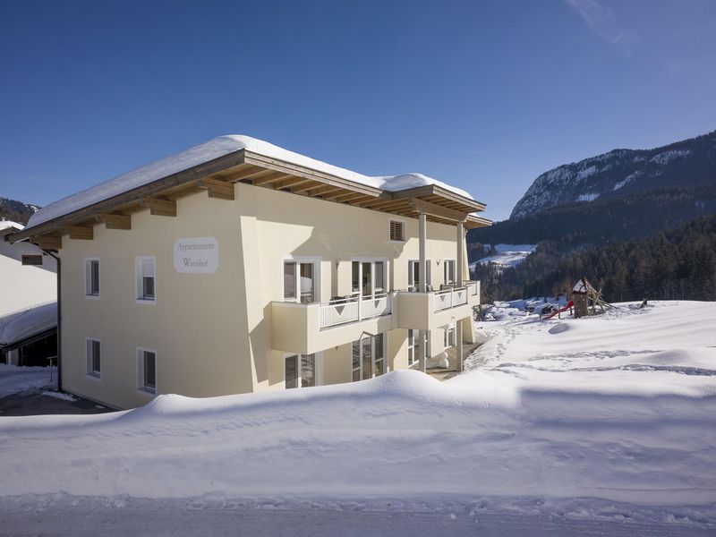 Appartementhaus Wanishof Thiersee Ansicht Winter