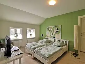 Schlafzimmer 1 mit Doppelbett