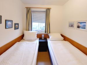 Schlafzimmer in der Ferienwohnung Inselnest am Meer in Wittdün auf Amrum