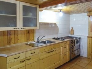 Küche mit Kaminofen