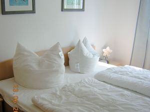 Schlafzimmer mit Doppelbett