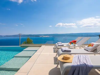 pool area with panoramic views of the island and sea
