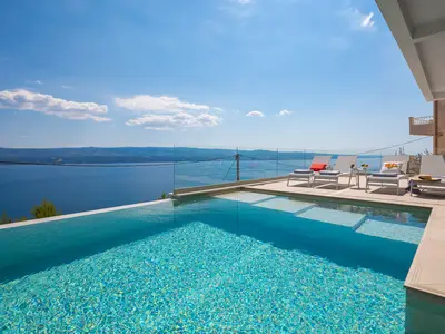 pool area with panoramic views of the island and sea