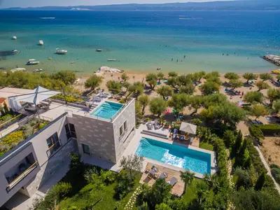 Strandvilla Flores mit Innenpool, Außenpool, Sauna, Fitnessraum, Whirlpool auf dem Dach
