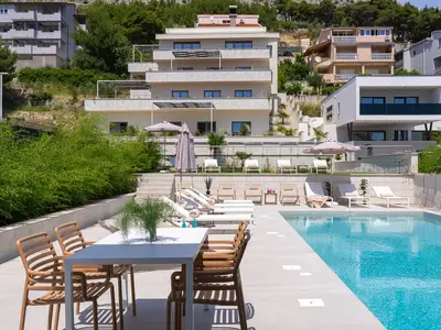 Holiday Resort Almissum, a stunning 11-bedroom luxury villa just 200 meters from the pristine sandy beach.