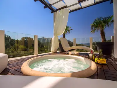 Relaxing lounge area with amazing view and Whirlpool suitable for 4 person