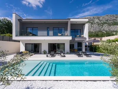A 40 square meter heated swimming pool with a shallow area for relaxing dips 