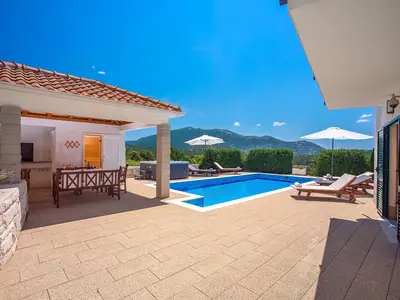 Spacious terrace with lounge and dining area
