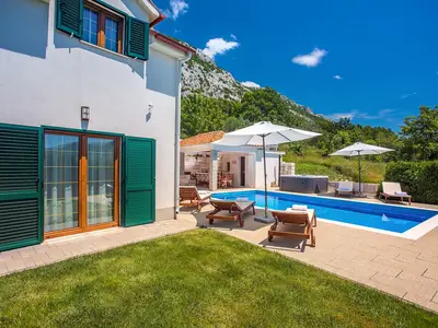 Spacious terrace with lounge and dining area