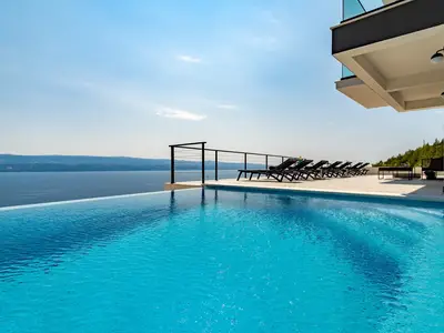 Seaview Villa Marila with 22,5 sqm private heated pool with hydromassage, 3 en-suite bedrooms (6+2 people), 1km from beach