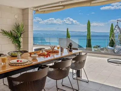 Outdoor, covered dining area connected with pool area
