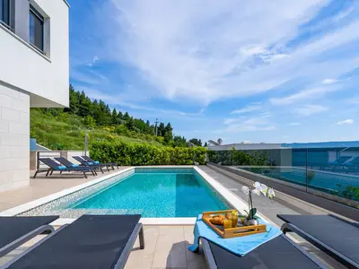 Heated Pool 8,6 m X 3,5 m with sun deck area and outdoor dining area with BBQ
