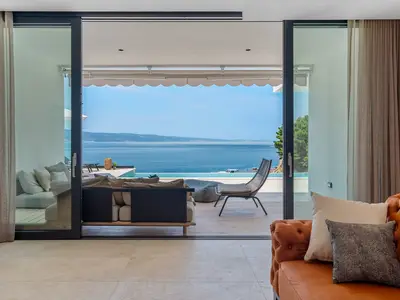 The GROUND floor has an open-plan living area that includes: a fully equipped kitchen (38sqm) with all the amenities a modern guest needs
