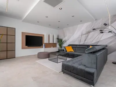  Very comfortable living room (32sqm) with sofas, flat screen TV, PS5, Bluetooth speaker system, all fully air-conditioned.
