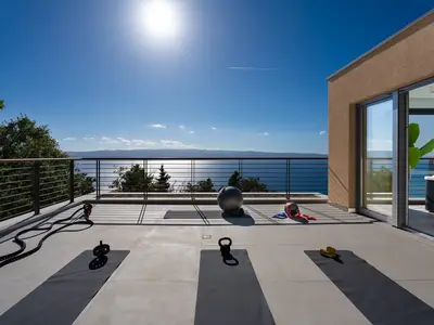 East side there is a terrace with an outdoor Treadmill, fitness mats, weights, so you can start your day being active, watching the sunrise while hearing only the birds