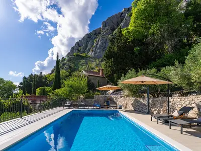 Private, heated 8,5m x 4m pool with massage, spacious sun deck area with 8 deck chairs
