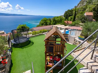 Well-located children playgound right next to the pool area, allowing parents to relax