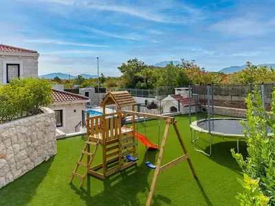 Playground is perfect fun. 
Spend your vacation with kids in Villa Neven 