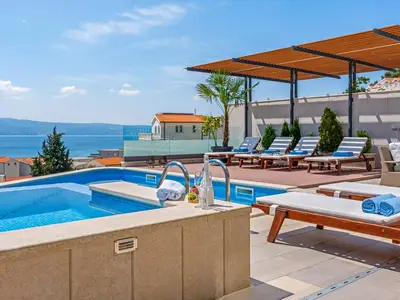 Private heated pool and 6 comfortable lounge chairs